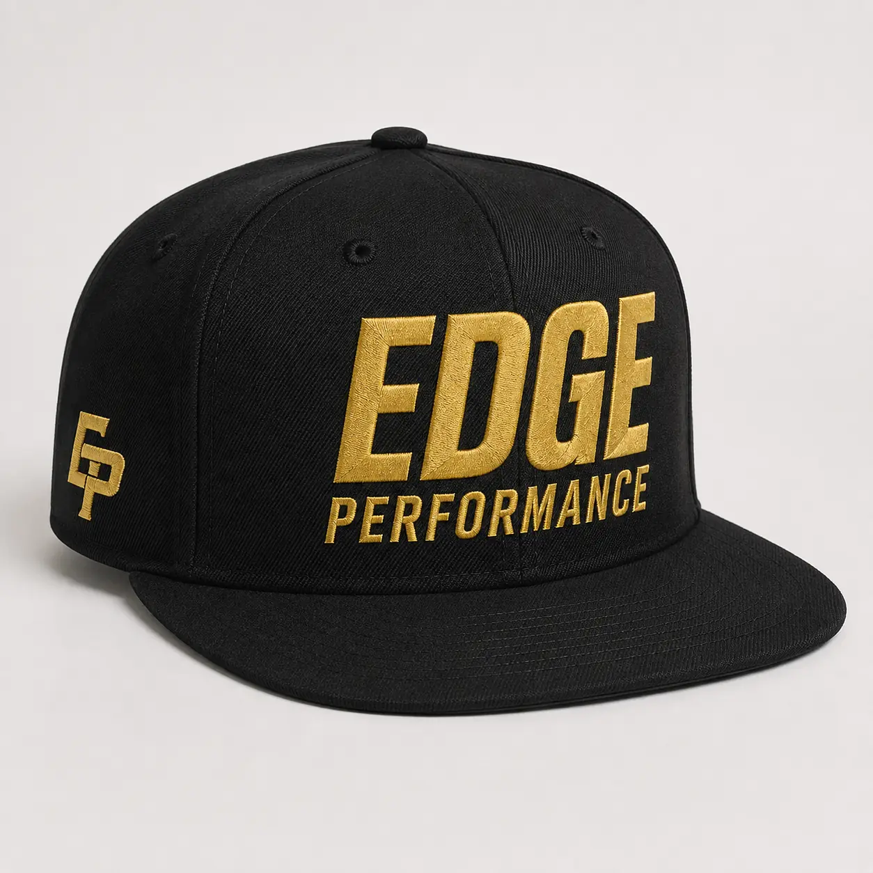 Black EDGE Performance snapback with gold embroidered front wordmark